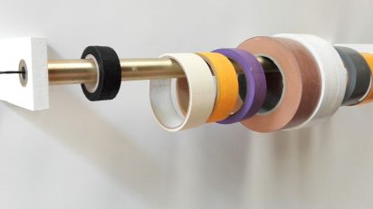 Klaas Vanhee. Untitled (different rolls of tape), 2019. Wood, metal, glue, screws, acrylic, oil, varnish, paper, nylon and rope 13x64x14cm.
