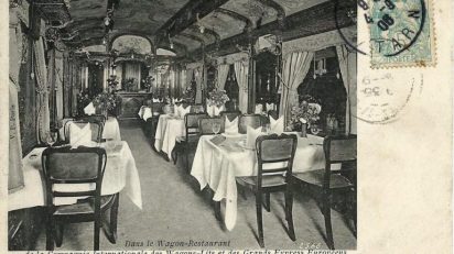 A vintage postcard showing the Dining car of the Orient Express, 1910 c.ca One of the rare public pictures.